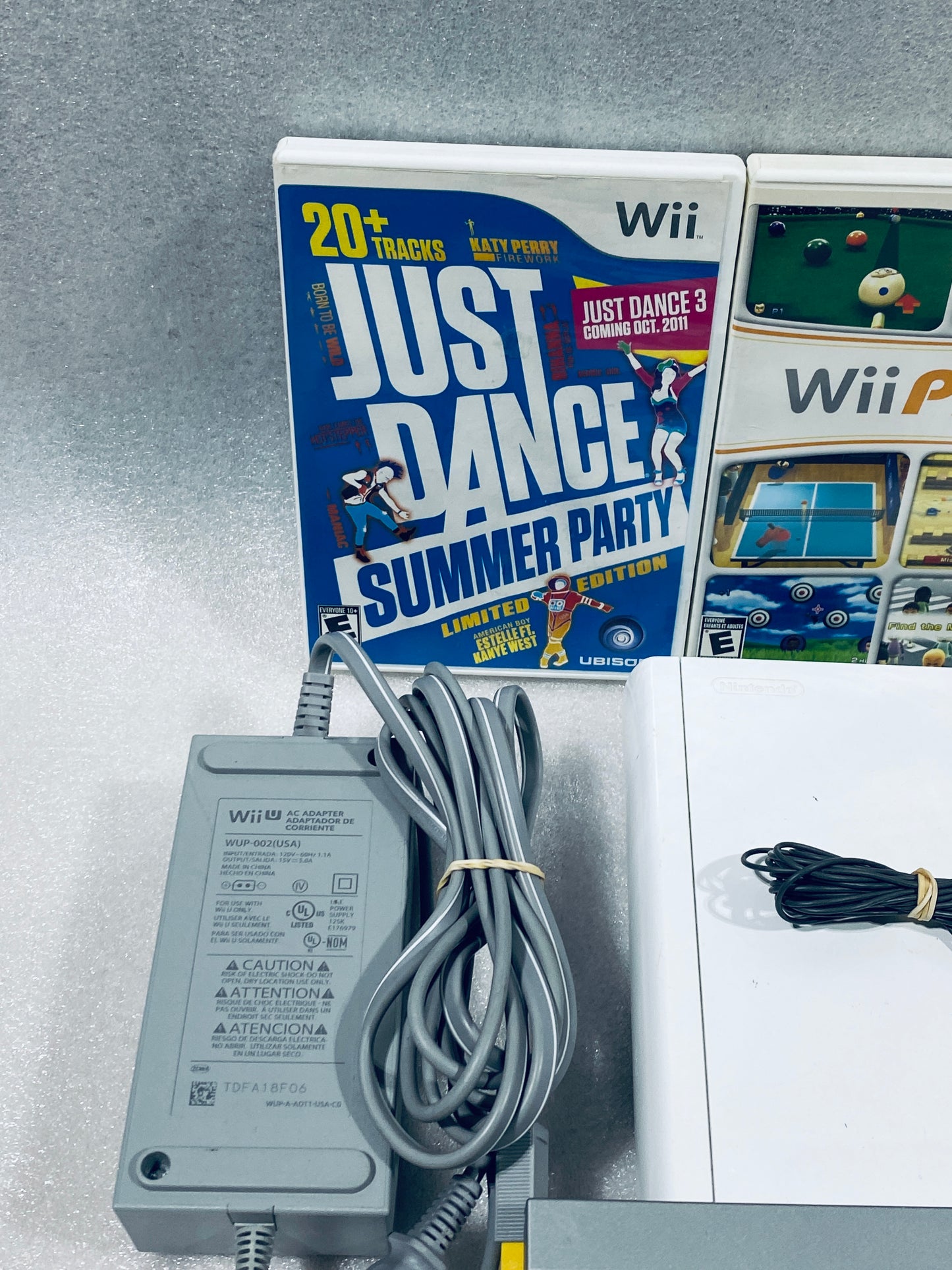 Nintendo Wii U 8GB White System With Wii Remote, Two Nunchuk & Three Games