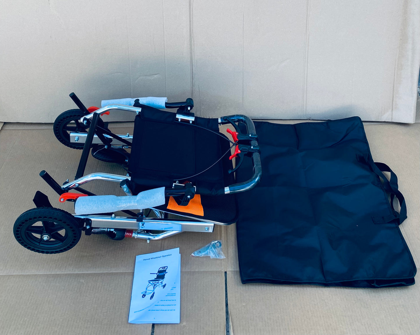 New Other Jinkee Ultra-Lightweight 19lb. Foldable/Portable Aluminum Travel Wheelchair With Carrying Bag, Supports 220lbs. & 8” Wheels
