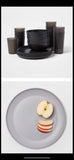 Lot #186 - Lot of 44 - New Room Essentials Dinnerware - (24) 10.5" Plastic Dinner Plates - Gray & 20pc Plastic Dinnerware Set - Black (MSRP $32)