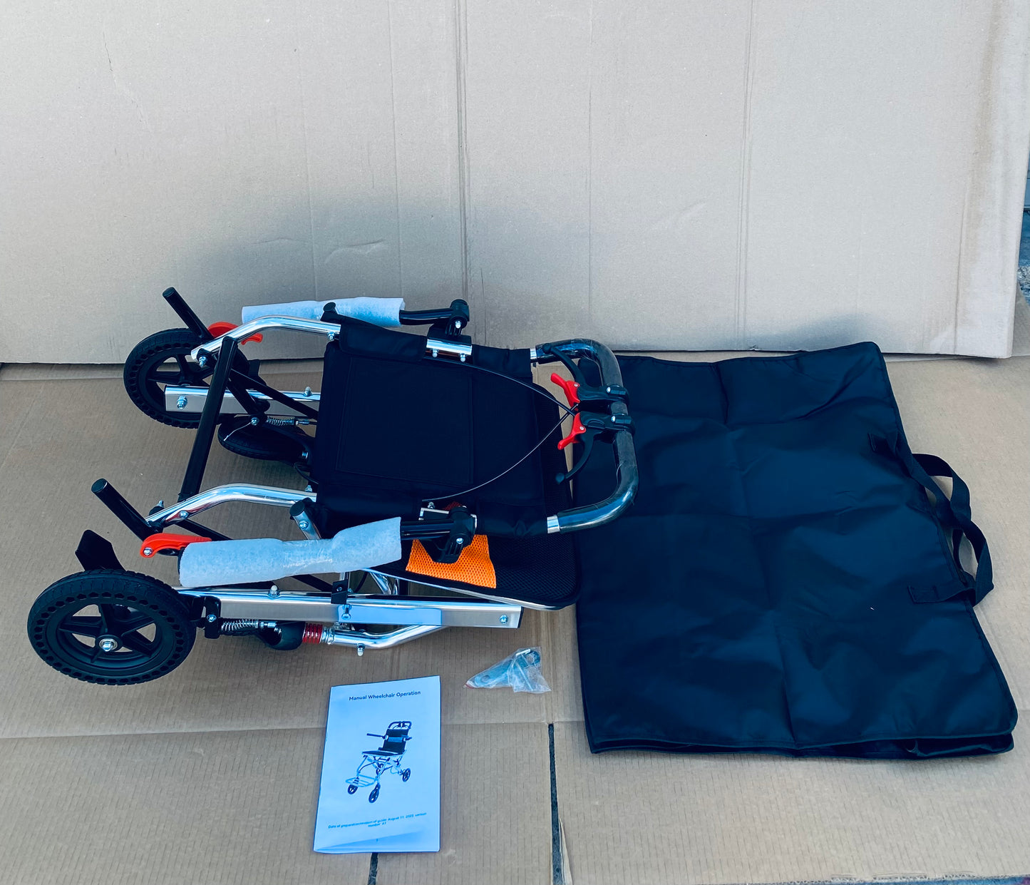 New Other Jinkee Ultra-Lightweight 19lb. Foldable/Portable Aluminum Travel Wheelchair With Carrying Bag, Supports 220lbs. & 8” Wheels